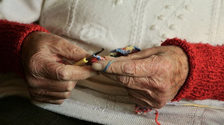 Close Up of Old Lady Knitting