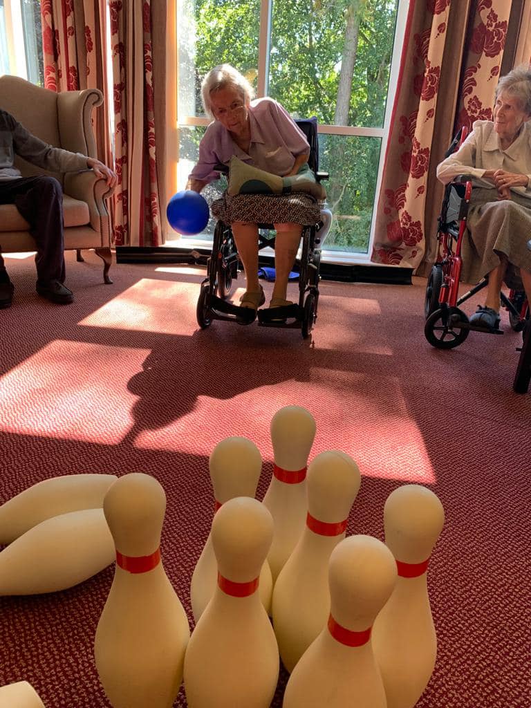 Residents Playing a Game of Bowling
