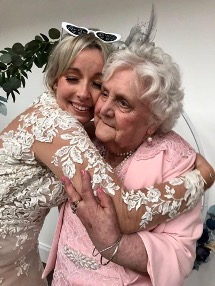 Resident Hugging Her Granddaughter At Her Wedding